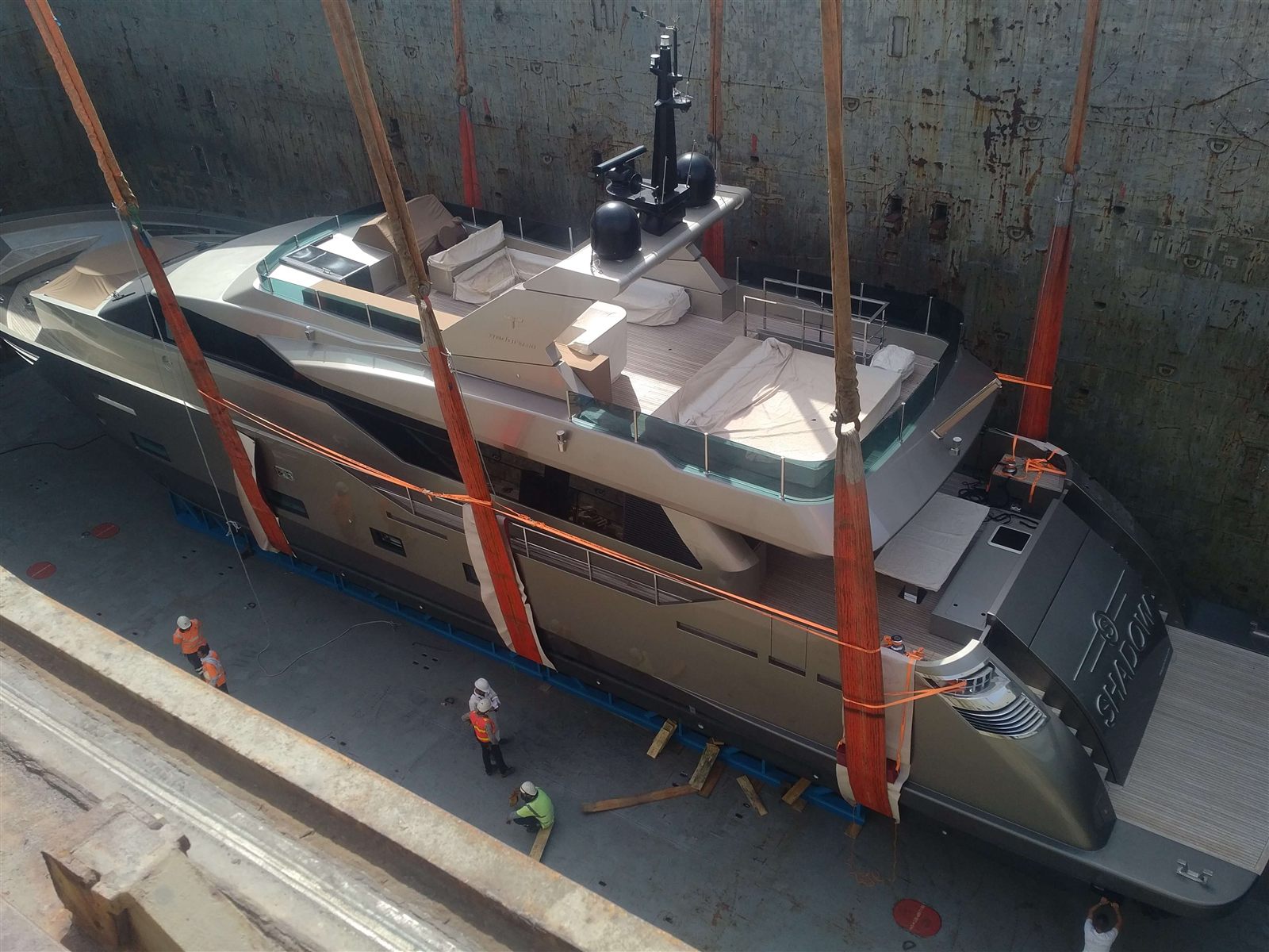 Motor yacht on its cradle on a ship deck before transport to Kuwait